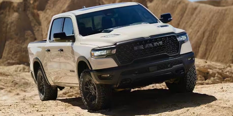 Ram TRX pickup truck driving off-road in a desert landscap